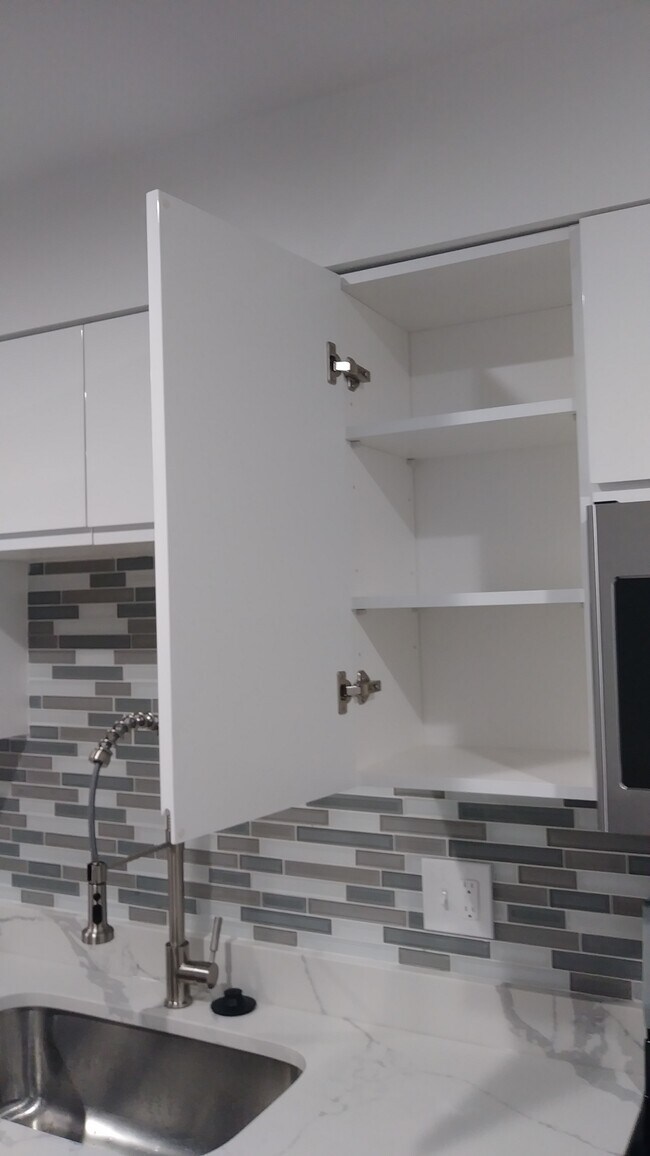 High Gloss Cabinets - 5 N Caroline St