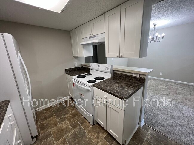 Building Photo - 8745 Whispering Pines Dr
