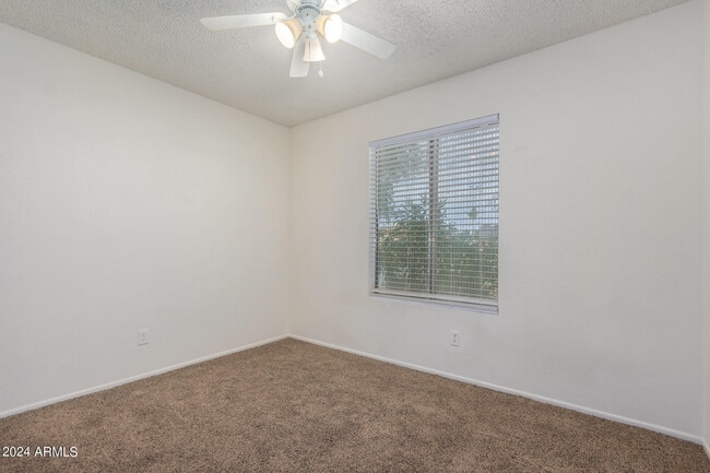 Building Photo - 10047 N 48th Ave