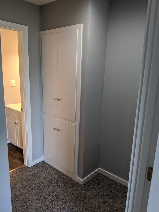 lots of cabinets for storage upstairs - 452 Edinburgh Rd