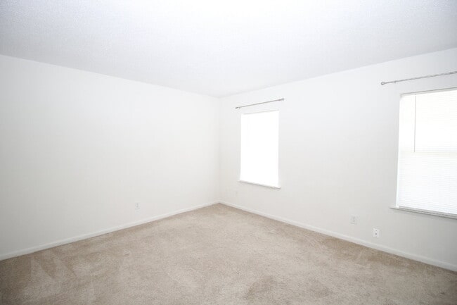 Building Photo - 2-Bedroom Waterfront Townhouse with Community Pool – Available 11/26