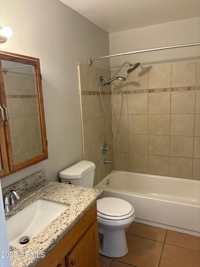 Building Photo - 909 S Priest Dr