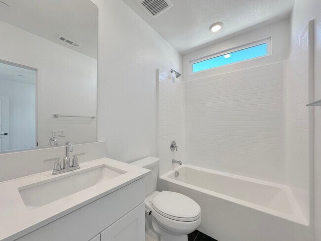 Building Photo - Luxury 3-Level Townhome for Rent | 2BR + 3BA | 1,500 Sq Ft with 2-Car Garage