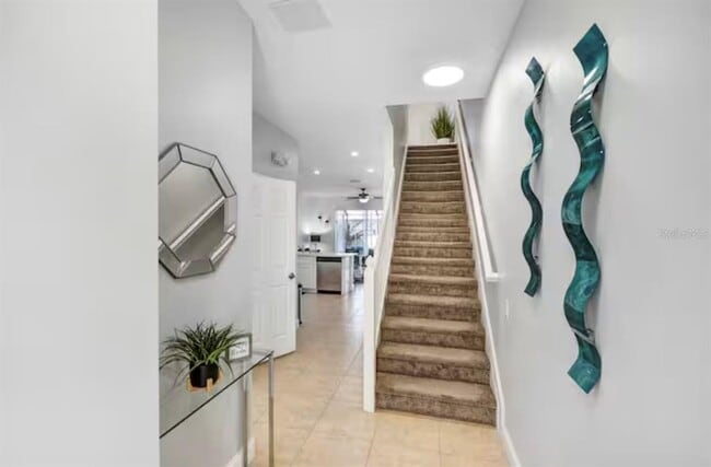 Building Photo - 8117 Princess Palm Ln