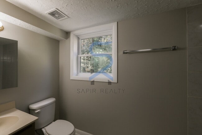 Building Photo - Move in before December 15th and choose your reward: a $250 Amazon Gift Card or a 55" Smart TV!