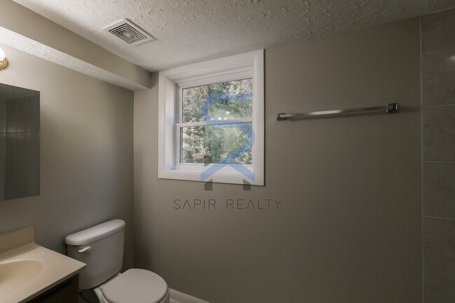 Building Photo - Move in before November 30th and choose your reward: a $250 Amazon Gift Card or a 55" Smart TV!