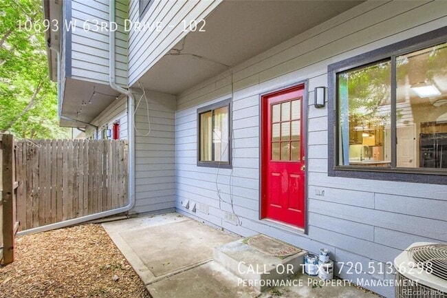 Building Photo - 10693 W 63rd Dr