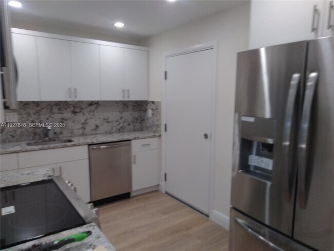 Building Photo - 8325 SW 72nd Ave