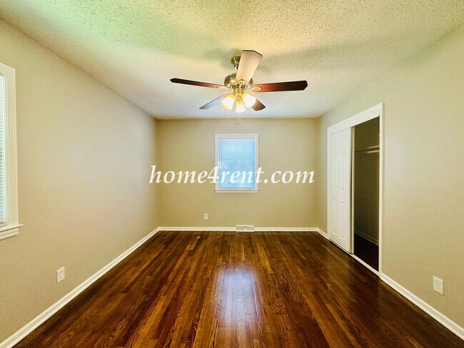 Building Photo - Updated Raytown Ranch w/ Wood Floors, SS Appliances, Finished Basement and a Fenced Yard!