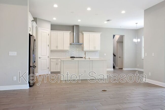 Building Photo - 6133 Lungo Lago Dr