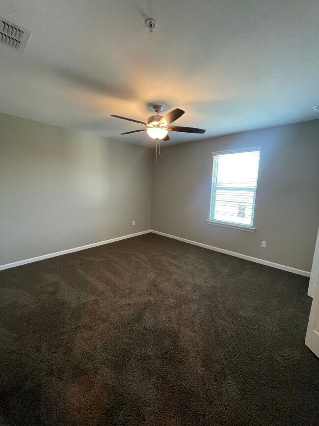 Building Photo - Spacious New 3BR/3BA Condos – Pool & Gym Amenities