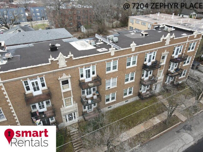 Building Photo - 7204 Zephyr Place - 2E