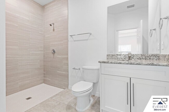 Building Photo - Modern 3-Bed, 2-Bath Townhome with Private Yard & 2-Car Garage