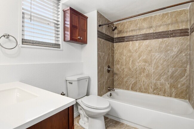 Building Photo - $1,520.95 - 2 bed, 1 bath updated ground floor Condo in Lakewood with In Unit Laundry