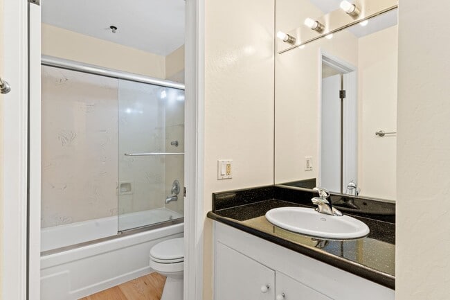 Building Photo - Modern Oakland Living: New Floors, Private Balcony, and Parking