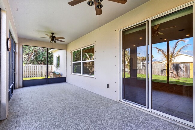 Building Photo - Modern 4-Bedroom Rental with Screened Patio & 2-Car Garage