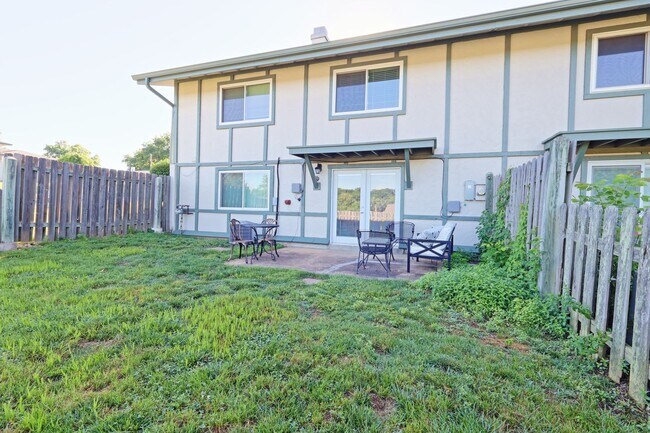 Building Photo - Spacious 3-Bedroom Attached Villa with Finished Basement & Private Fenced Yard!