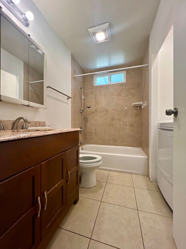 Building Photo - Beautiful, Bright & Airy Beach House--3Beds, 2Baths with Yard