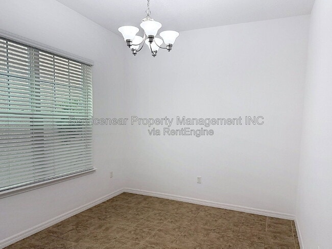Building Photo - 9428 Woodcrane Dr