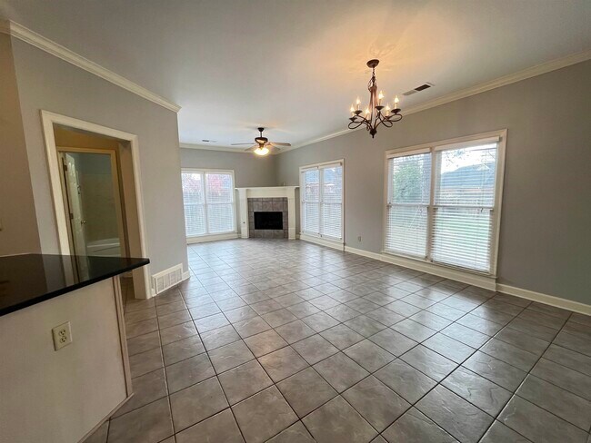 Building Photo - 8570 Meadow Green Dr