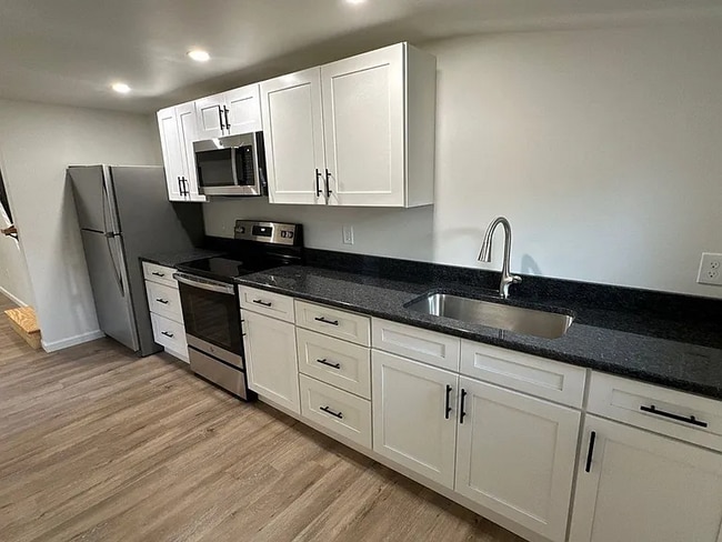 Building Photo - this beautifully updated three-bedroom, one-and-a-half-bath home in Columbia