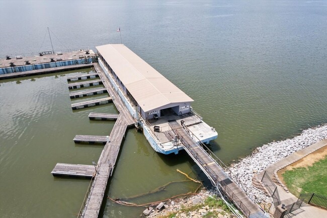 Building Photo - Riverfront Living with Spacious Layout and...
