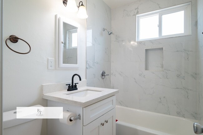 Building Photo - Remodeled House with Spacious Flat Lot - L...