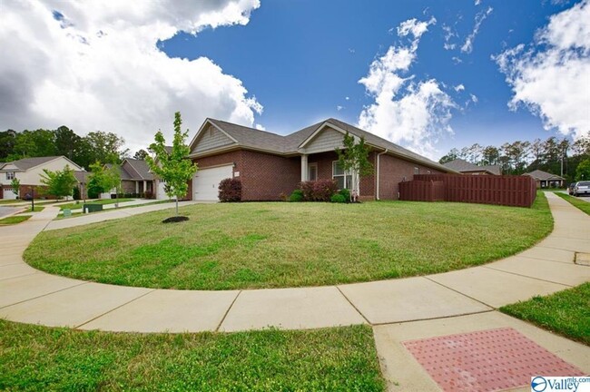 Building Photo - SPACIOUS FOUR BEDROOM BRICK HOME