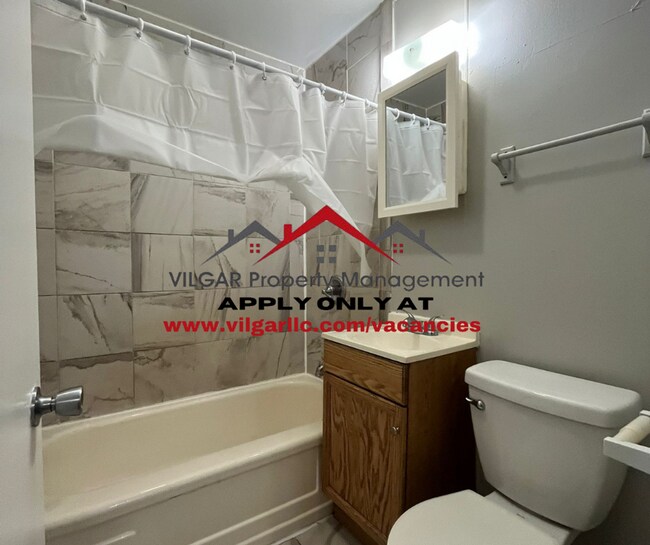 Building Photo - Step into comfort and security in this bea...