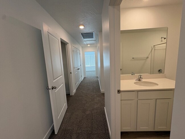 Building Photo - FOUR BED HOME AVAILABLE NOW