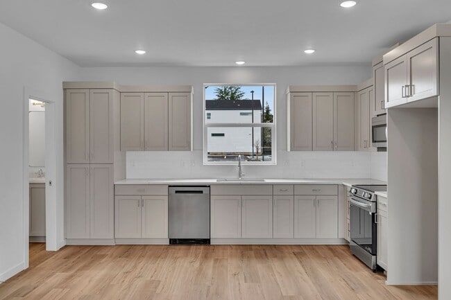 Building Photo - Move In Special- Up to 3 Month's Free- New...