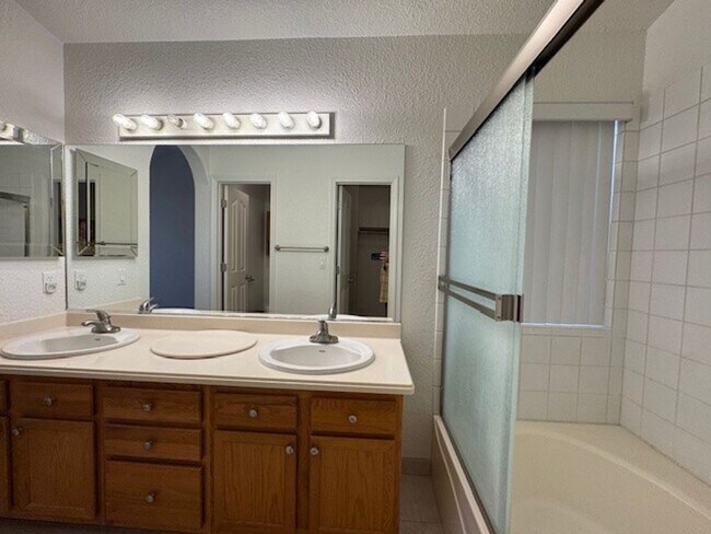 Building Photo - 2BR + 2 BONUS ROOMS with 54 foot Long Boat/Toys DEEP Garage