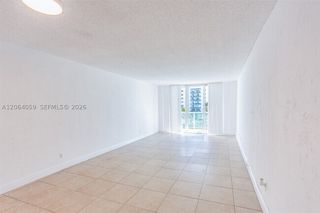 Building Photo - 19380 Collins Ave