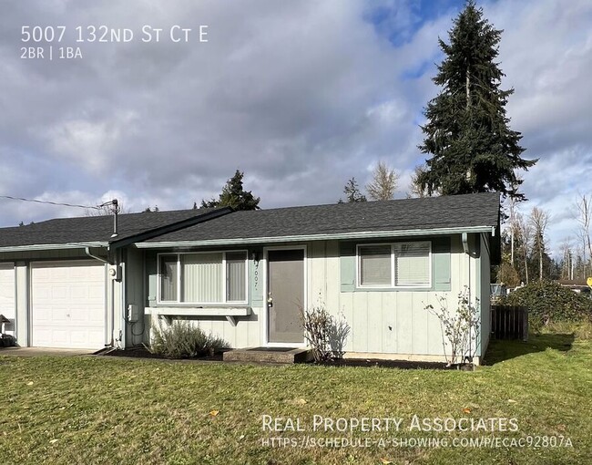 Building Photo - Spacious Two Bedroom Duplex Home with an A...