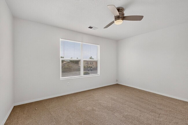 Building Photo - 6512 Los Pueblos Pl NW