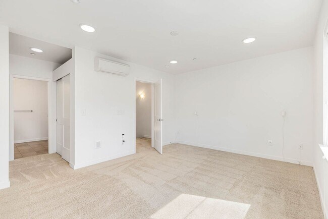 Building Photo - Modern Townhome in Upton at Crossroads Village – Stylish Living in a Prime Location