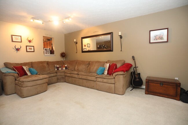 Building Photo - Available -Spacious 2 Car Garaged Townhome...