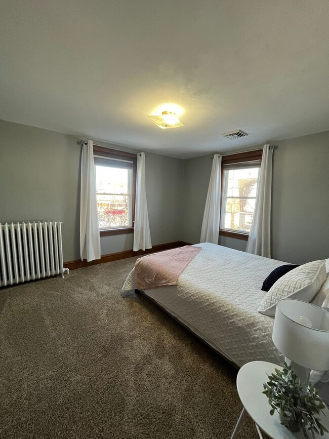 Building Photo - Spacious 4-Bedroom Home with Sunroom, Garage & Private Driveway!