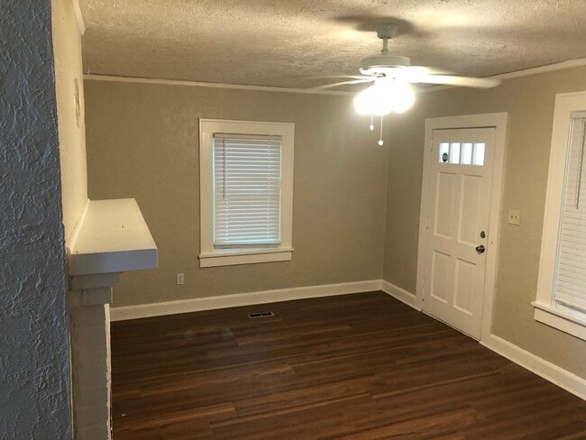 Building Photo - Freshly Painted 2x1 with Brand-New Plank F...