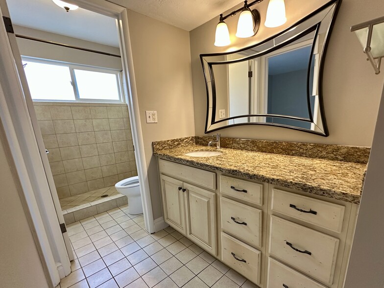 Bathroom - separate vanity area with granite countertop and great storage - 73 F St E