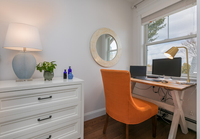 Desk area with peaks of the ocean - 11 Henry St