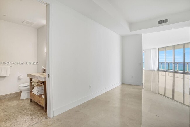 Building Photo - 9703 Collins Ave