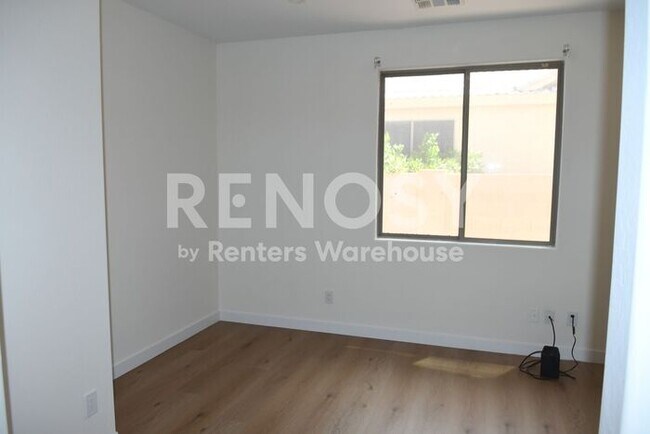 Building Photo - 3 Bedroom + Den Home with Pool & Putting Green – Pool Service Included!