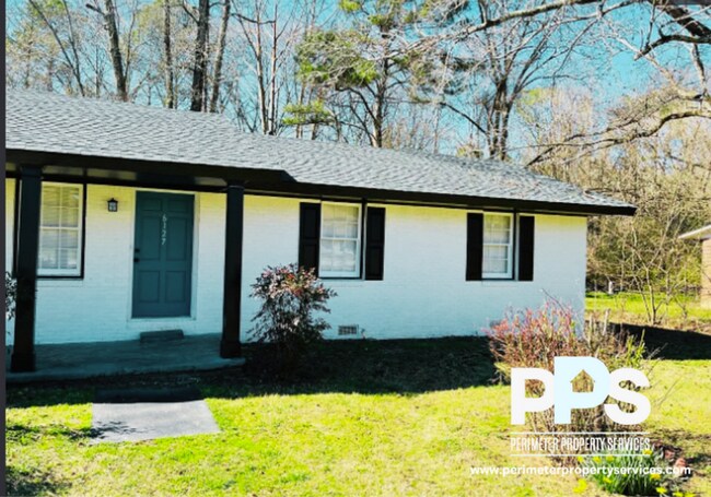 Building Photo - 6127-6129 E Fayetteville Dr