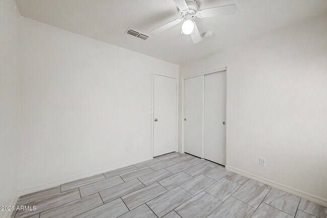 Building Photo - 8563 W Mission Ln