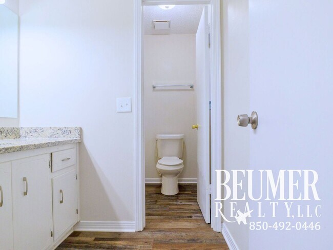 Building Photo - Charming Corner Haven 4BR/3BA Brick Home for Rent