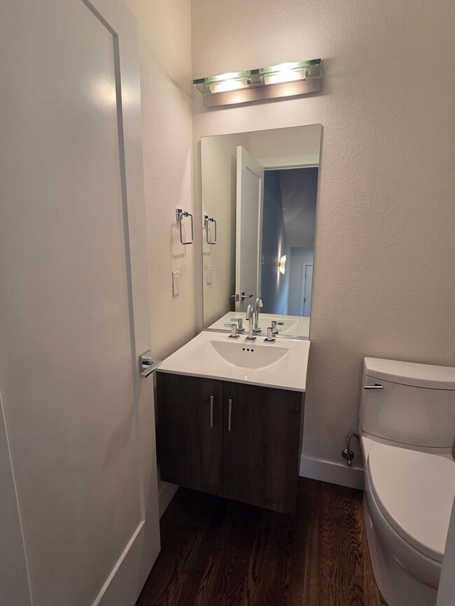 Building Photo - STUNNING 4-LEVEL TOWNHOME IN HIGHLANDS WITH SAUNA, 2-CAR GARAGE + AMAZING ROOFTOP DECK!