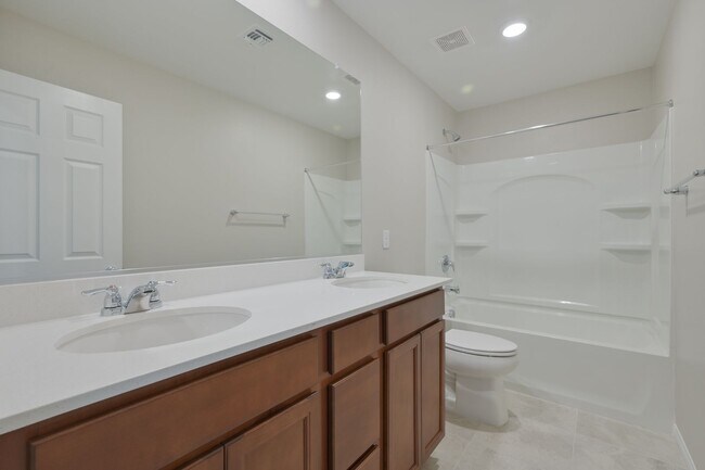 Building Photo - Mountains Edge!! Gated!!  4 bedrooms!! Primary Bedroom and bath down Stairs!! 2 Primary bedrooms!...