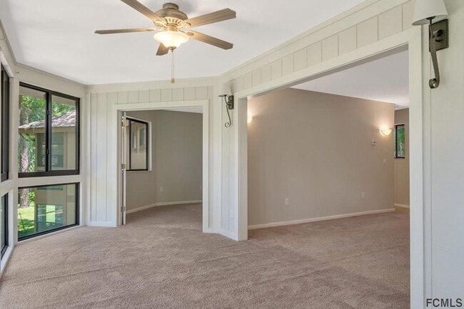 Building Photo - Stunning townhome on Palm Harbor Golf Course!
