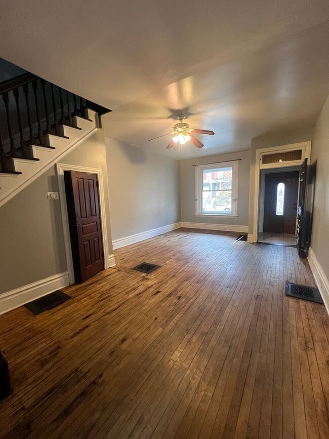Building Photo - Renovated and Charming Townhome Available Now